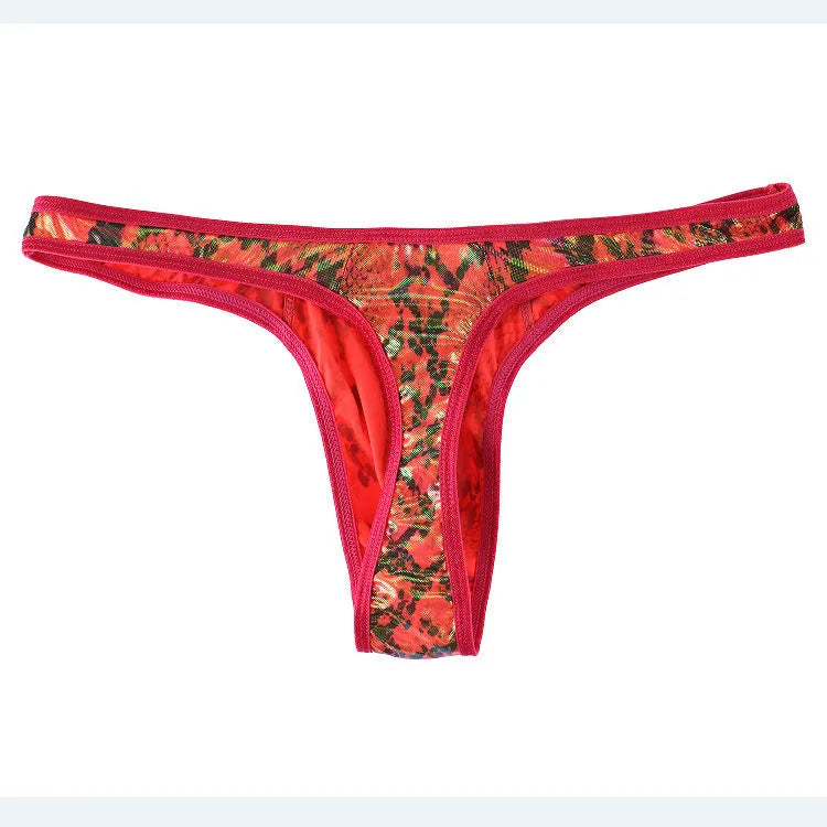 Men's green camouflage snake print thong underwear laid flat, showing low waist and T-back design.