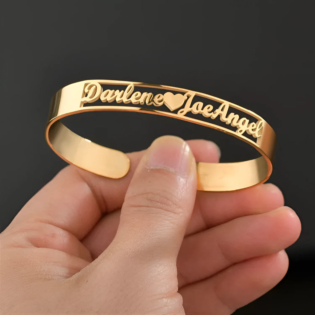 Customised name bracelet in stainless steel with silver finish and 10mm width on display