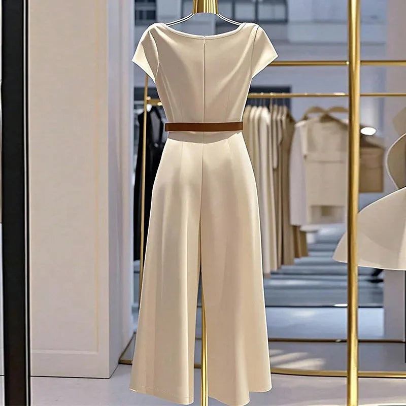 Womens satin jumpsuit in apricot with wide legs quarter sleeves and splicing detail