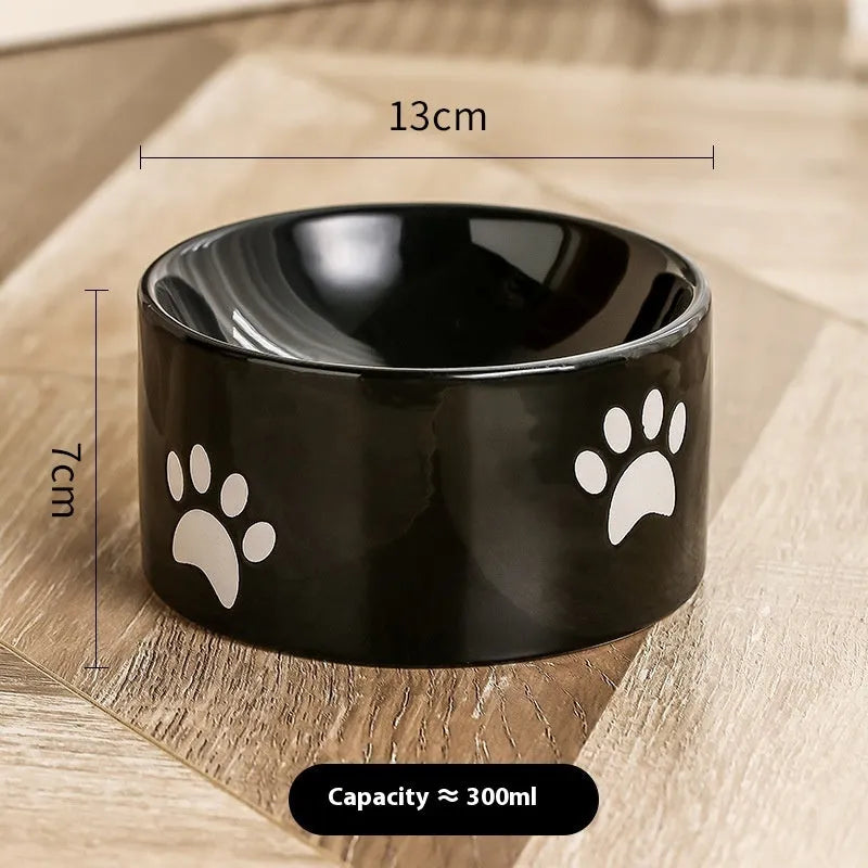 Ceramic cat bowl with high foot design in cat's paw pattern available in multiple colours