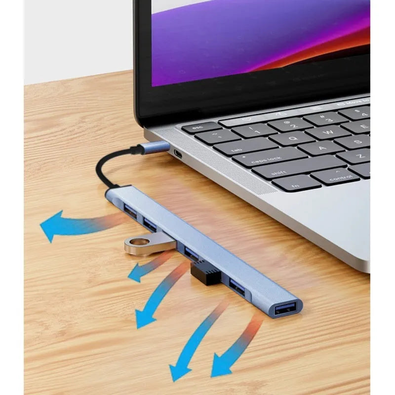 Blue USB-C 7-in-1 docking station with seven USB ports and 0.1m cable on a desk