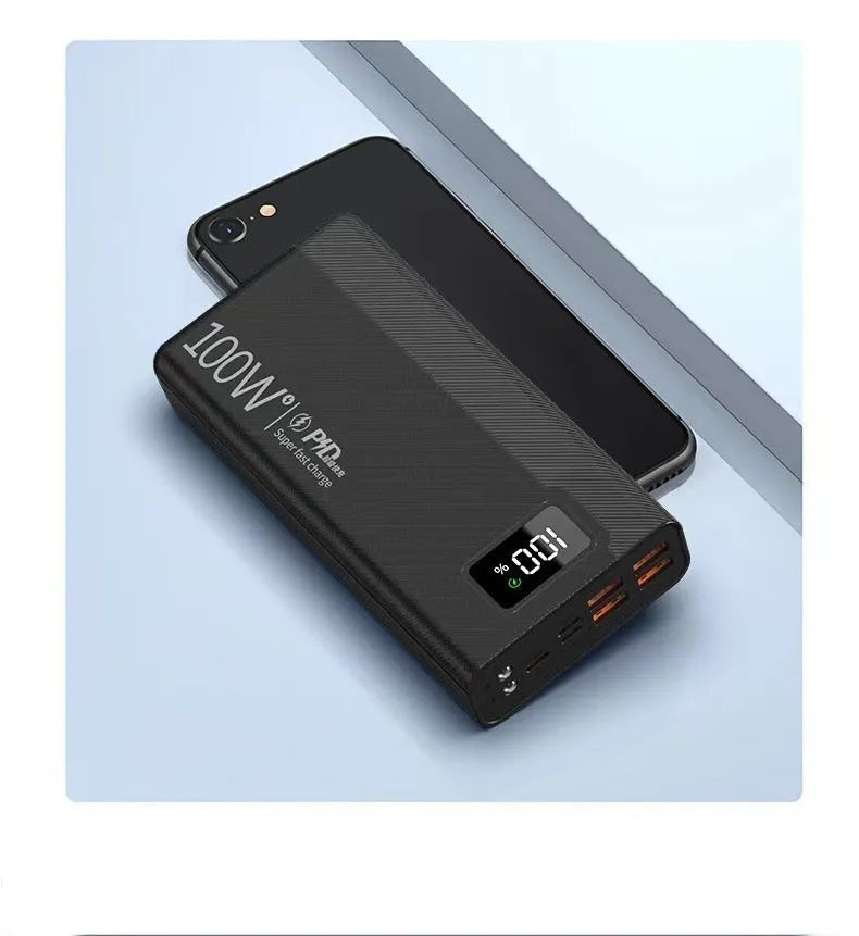 Large capacity power bank in black or white colour with plastic shell, showing front view with dimensions