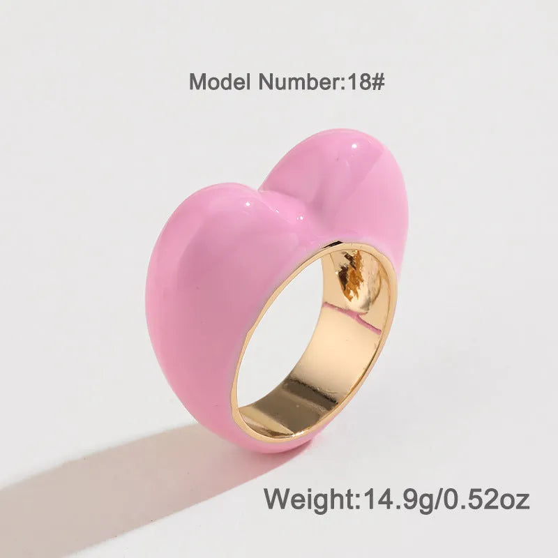 Three-dimensional enamel heart ring in zinc alloy showing raised design detail