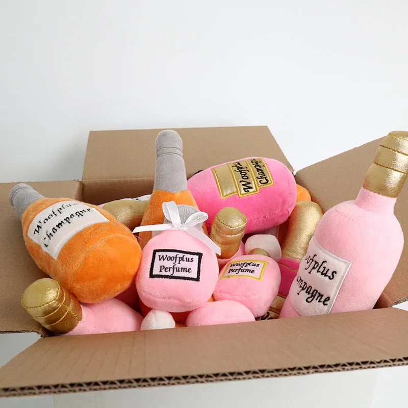Green plush dog toy shaped like a wine bottle on a white background.