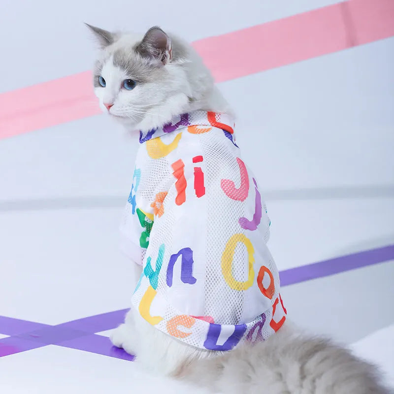 Colourful anti hair loss breathable mesh cat vest made from polyester on a cat