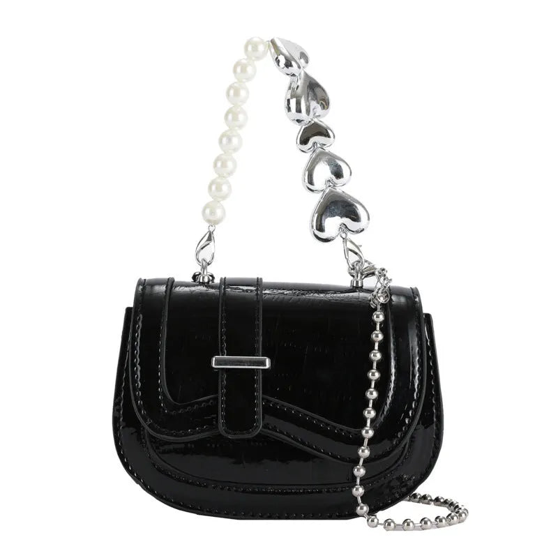 Women's mini PU crossbody tote bag in black, shown with single strap, phone pocket, and sandwich pocket.