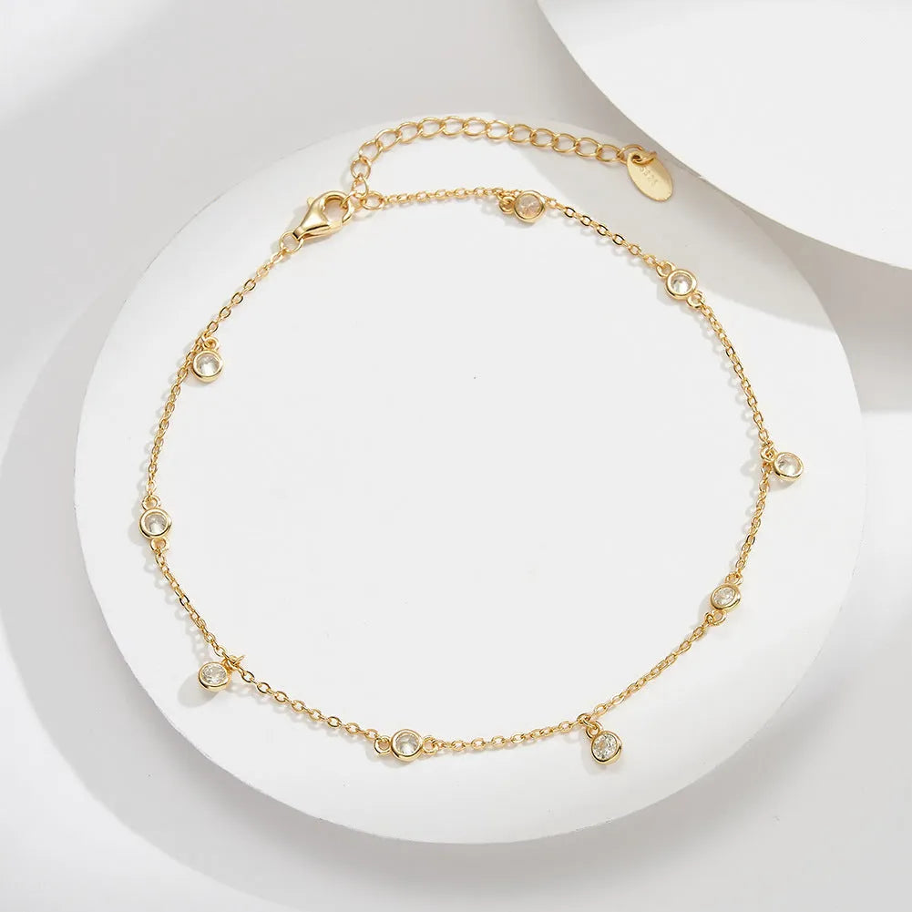 Women's silver anklet with geometric zirconium pendant in gold and platinum colour options