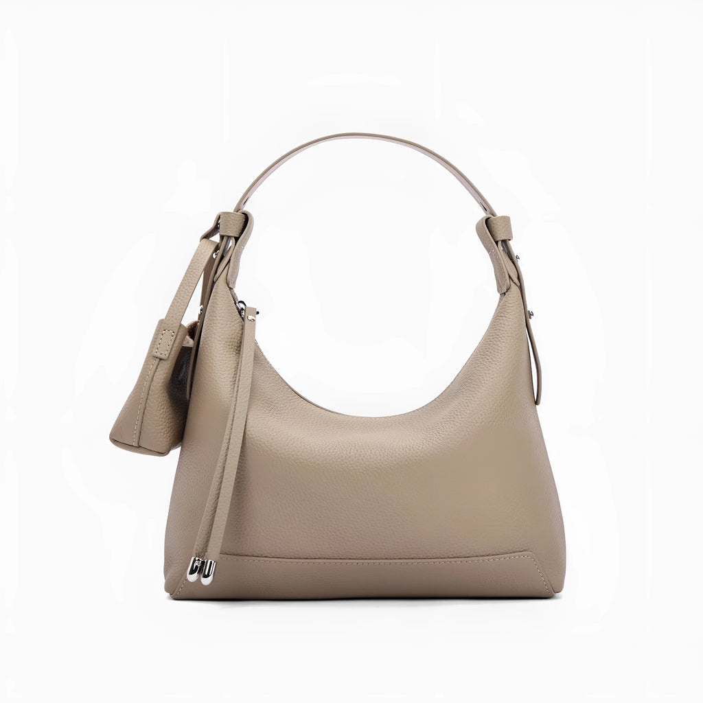 Genuine cowhide leather shoulder bag in urban simplicity style with visible sewing thread details