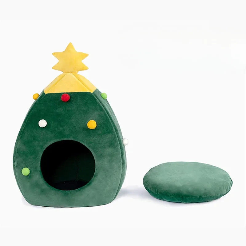 Red Christmas tree-shaped plush cave bed for cats and small dogs on a white background.