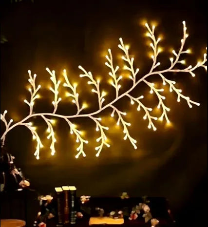 Flexible LED willow vine garland with birch bark texture and 144 warm white lights on 2.3m branch