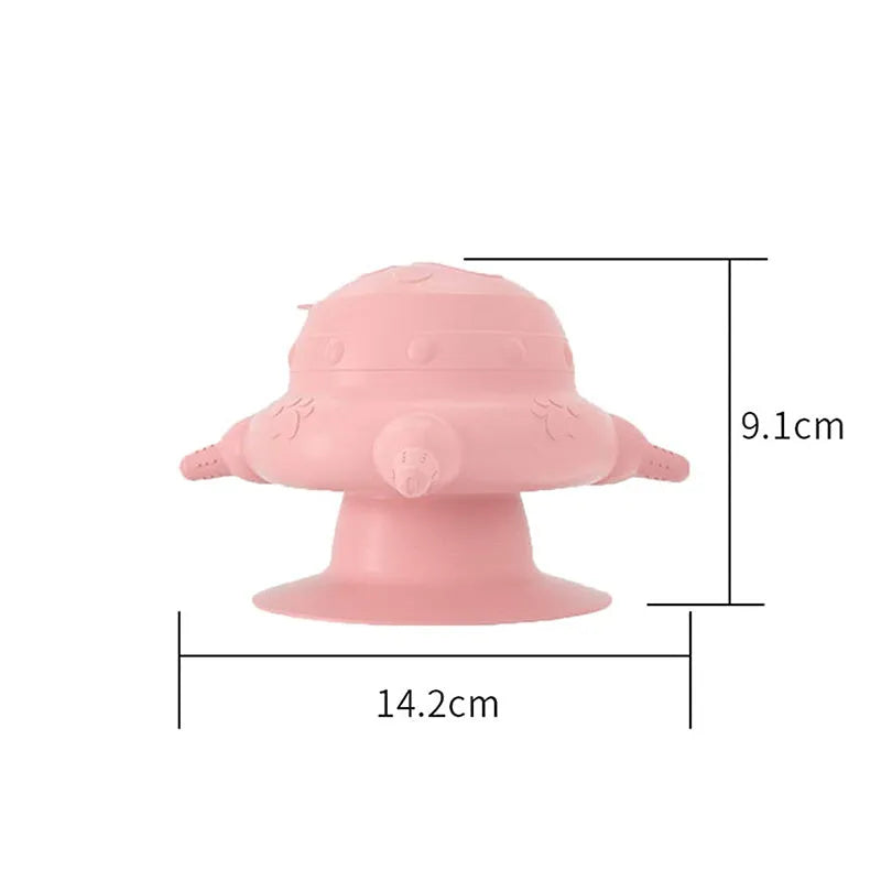 Pink silicone pet nursing bottle with bionic breast shape and four attached nipples on a flat base.