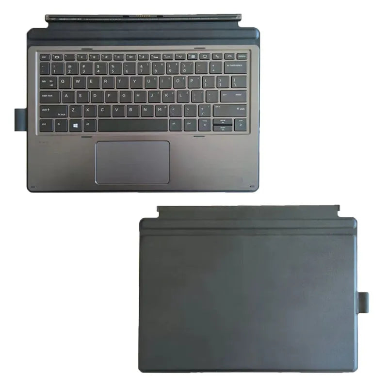 Official HP Elite X2 and Pro X2 tablet base keyboard with PS/2 connector on a desk.