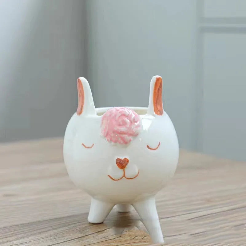 Ceramic succulent flowerpot with hand painted cartoon animal design in colourful pattern