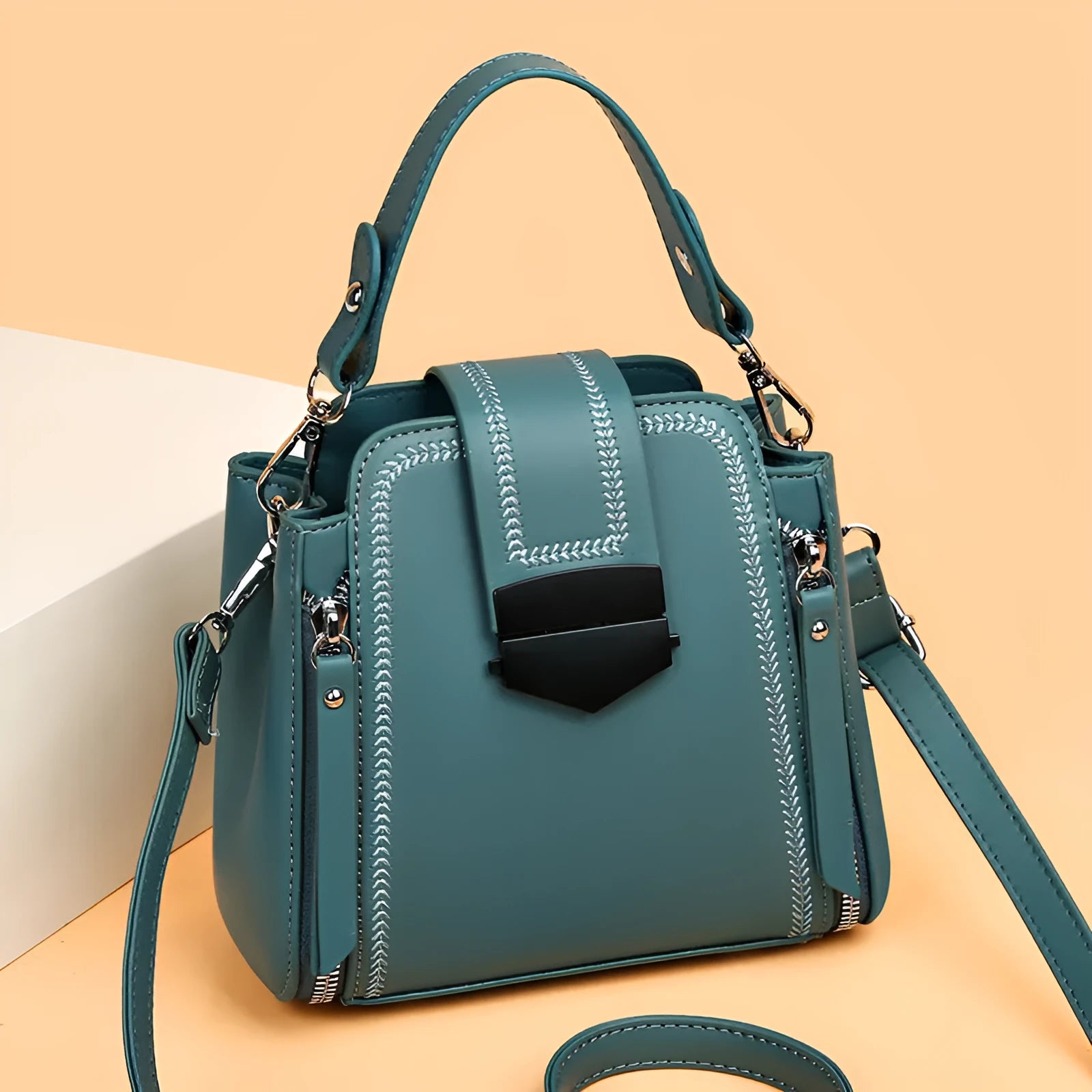 Square vertical PU leather handbag with textured finish and sewing thread detail in colour options