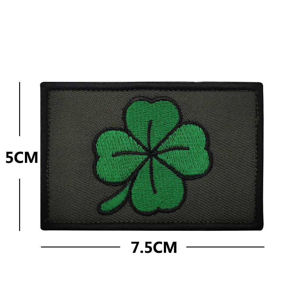 Outdoor embroidered fabric badge with velcro backing showing camouflage design