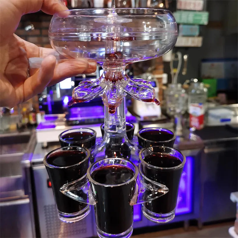 Clear PMMA 6-shot glass dispenser holder with rack and six cups on a table.