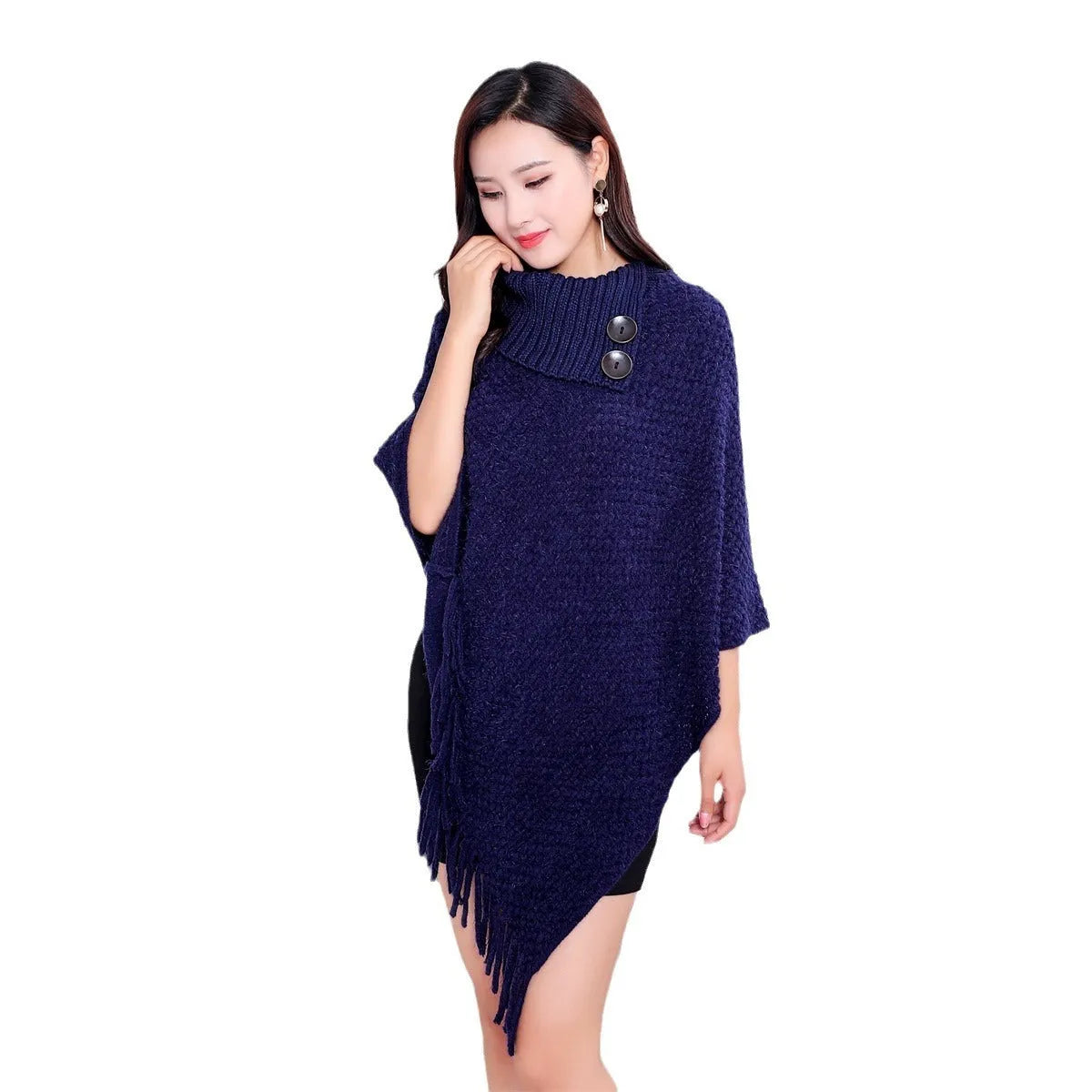 Women's knitted polka dot shawl cloak in sleeveless cape design showing colour options