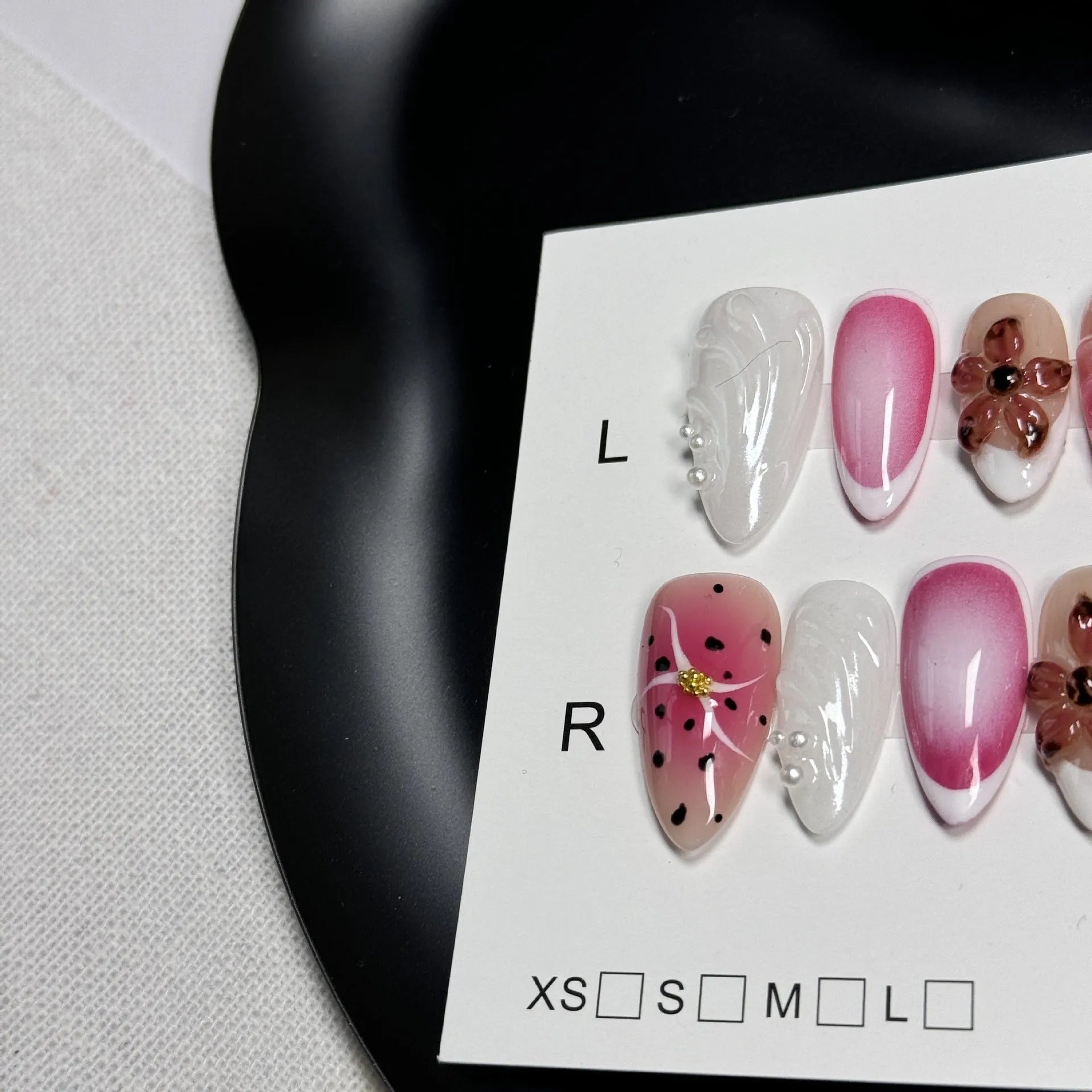 Almond-shaped nail art patch with embossed candy pattern, shown in sizes XS, S, M, L.