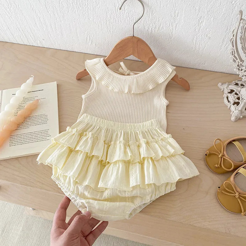 Beige cotton girls double layer bud-waisted shorts set with ruffled collar top on white background