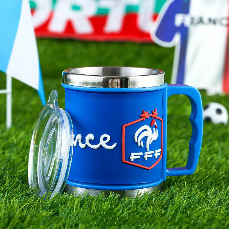 World Cup soccer mug souvenir in team colours, rubber and metal construction, 7.6cm diameter