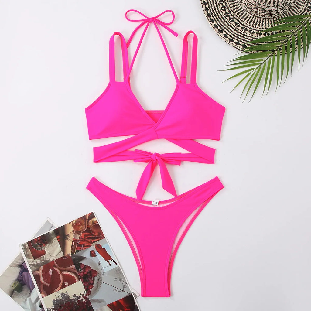 Women's solid colour strap bikini swimsuit in briefs style on a mannequin.