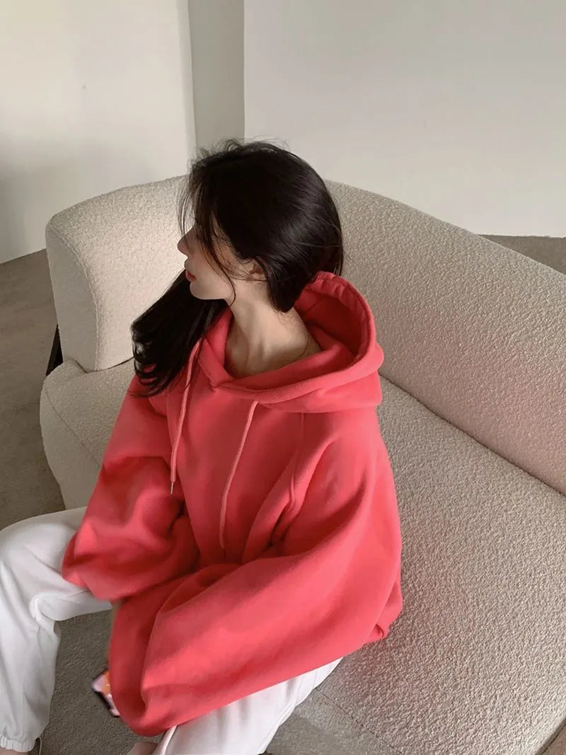Women's loose mulberry silk hooded sweater in solid watermelon red, sleeveless A-line cut