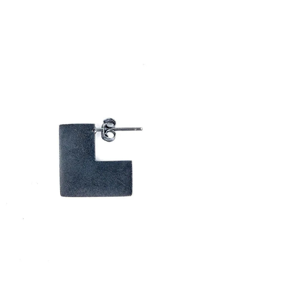 Oxidised black geometric square sterling silver earrings on a white background.