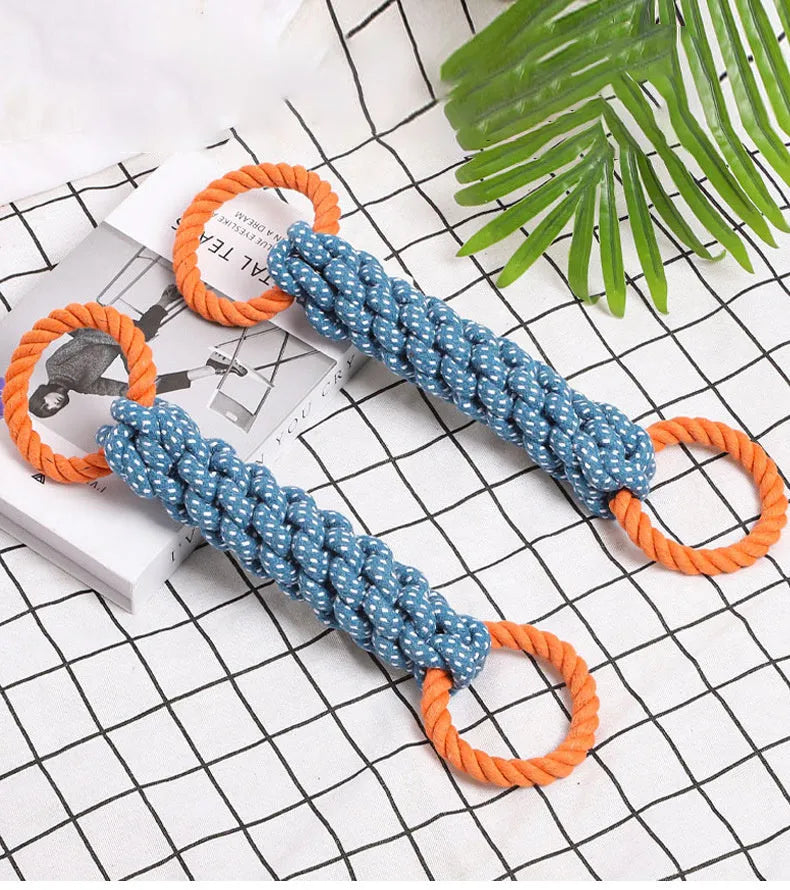 Blue double-ring braided cotton rope dog chew toy showing knot details and size against white background
