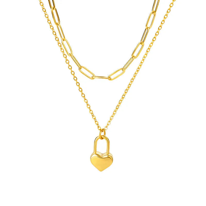 Multilayer heart pendant necklace with moon and star zircon accents on copper O-ring chain