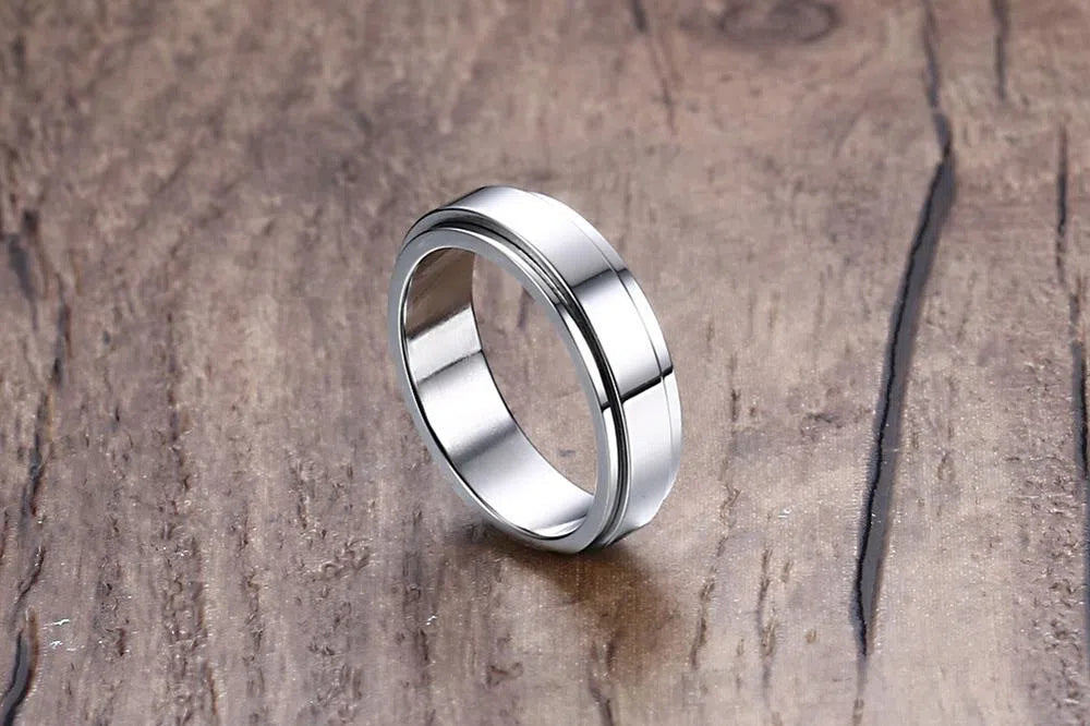 Rotatable stainless steel ring with electroplated finish, geometric Korean style, unisex fit, available in multiple colours and sizes.