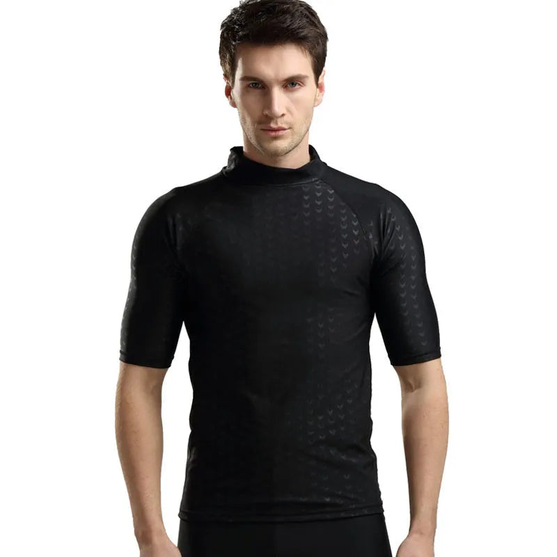 Men's black leopard print quick-dry swimsuit set with short-sleeved top and split shorts on beach