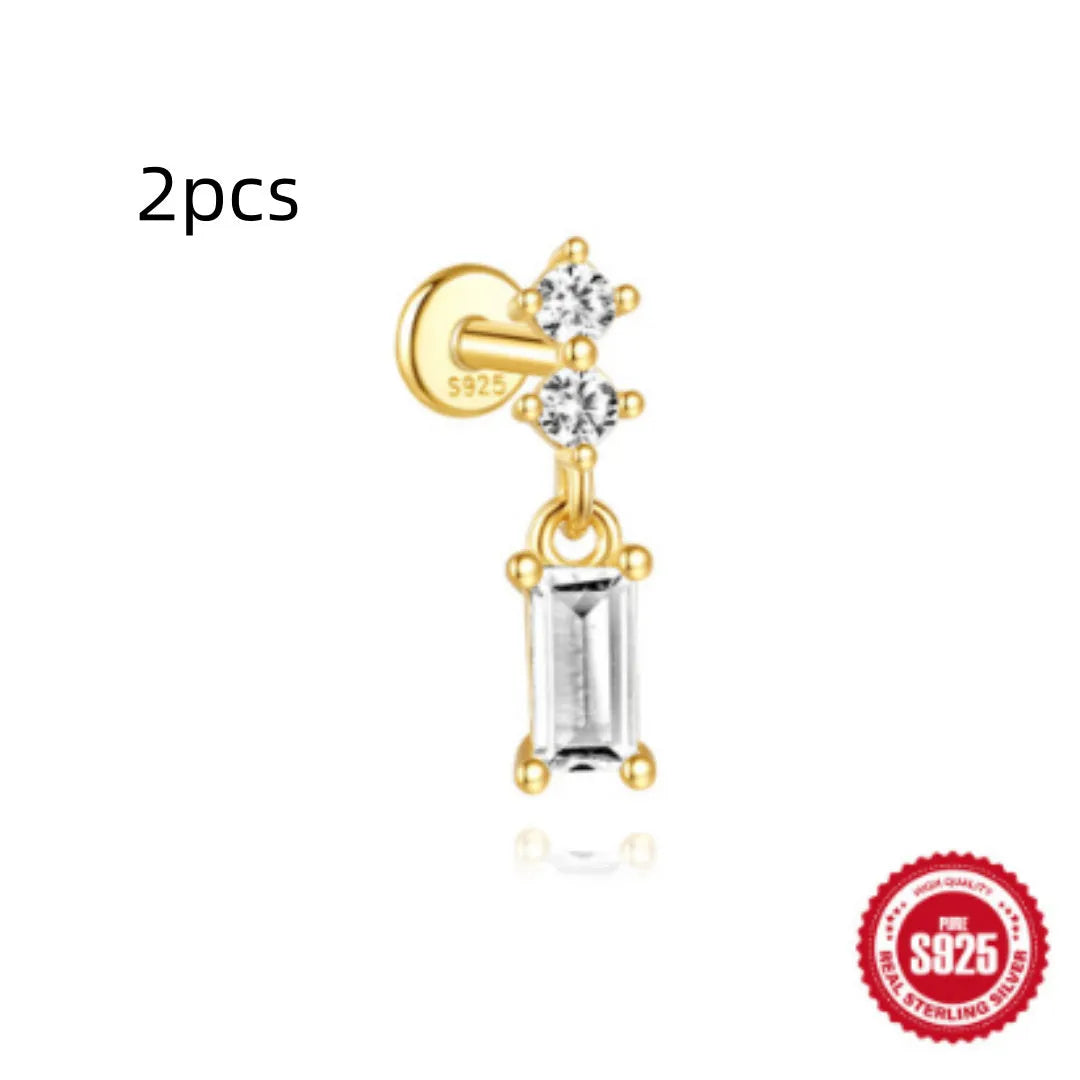 S925 sterling silver water drop shaped earrings with a flat spiral geometric design on a white background.