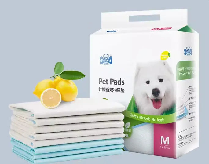 Pack of thickened, absorbent dog urine pads showing lemon scent, blue classic, and bamboo charcoal variants in different sizes.