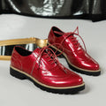 Women's black oxford shoes with wedge heel and sequin detailing, showing round toe and middle mouth cut