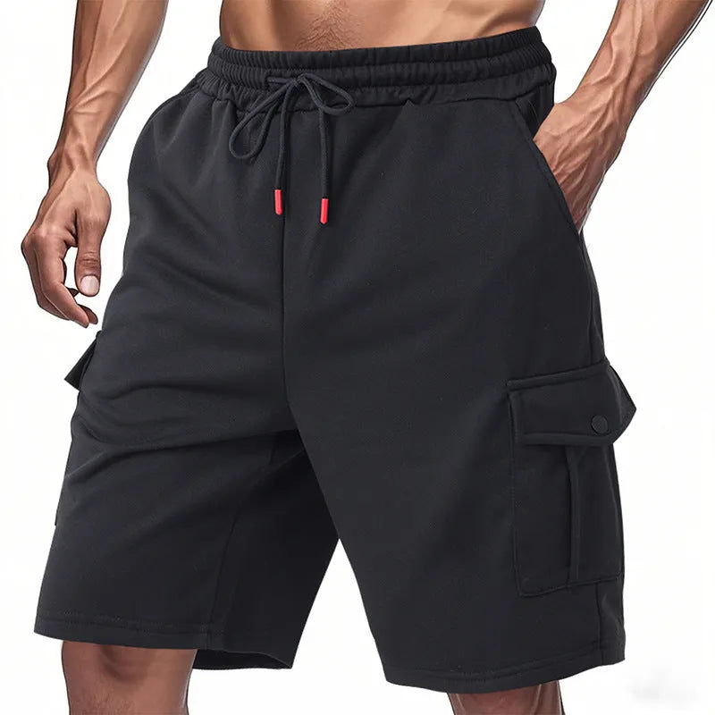 Heavy terry fabric cargo sports shorts with multiple pockets in light grey colour showing loose fit design