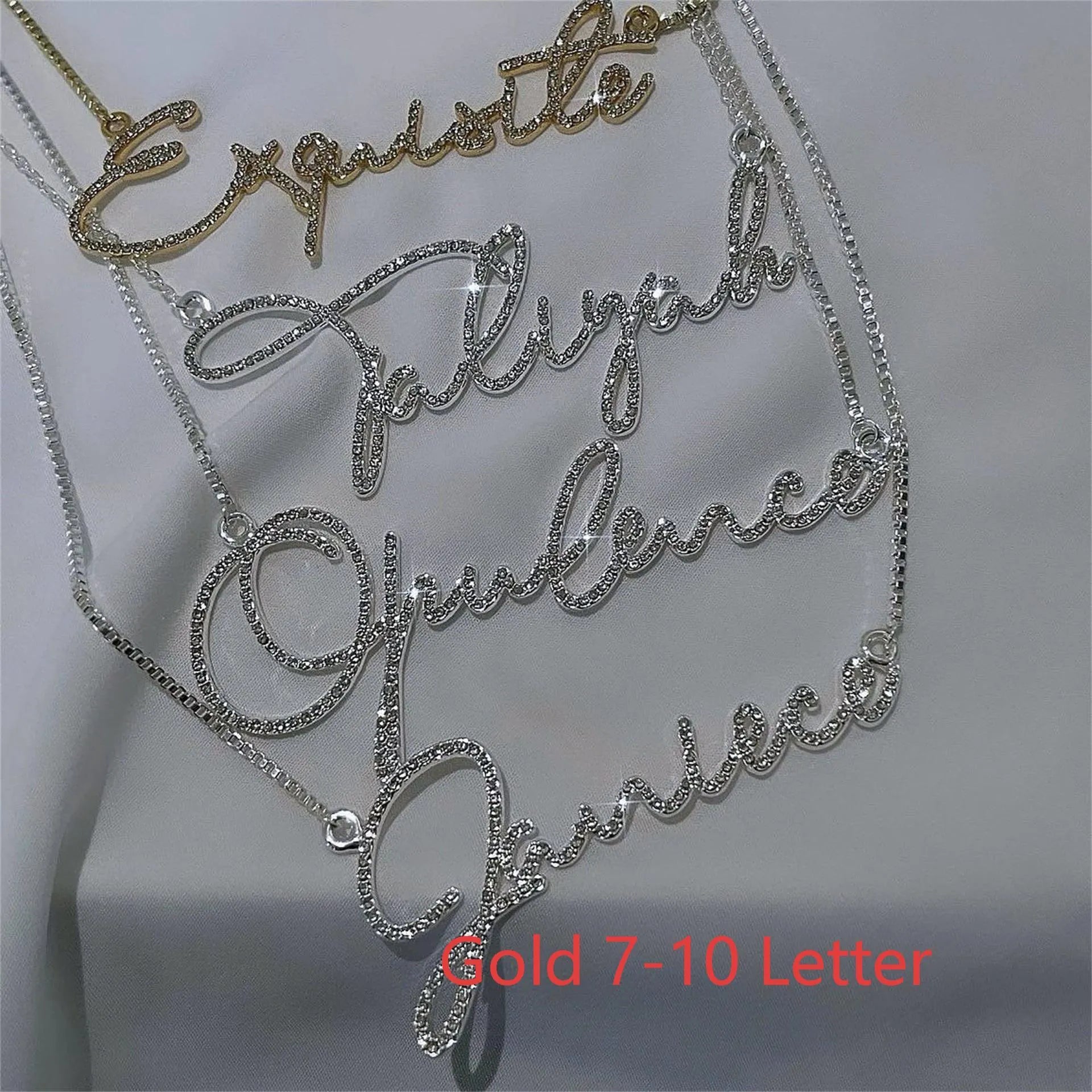 Stainless steel personalised name necklace with diamond studs on a silver chain, showing the letter 'A'.