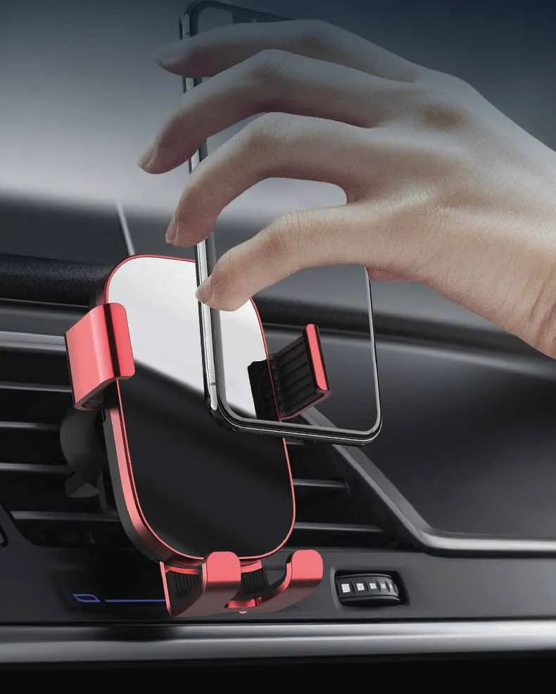 Black sucker car phone holder with USB cable attached to a dashboard for mobile phone charging and mounting