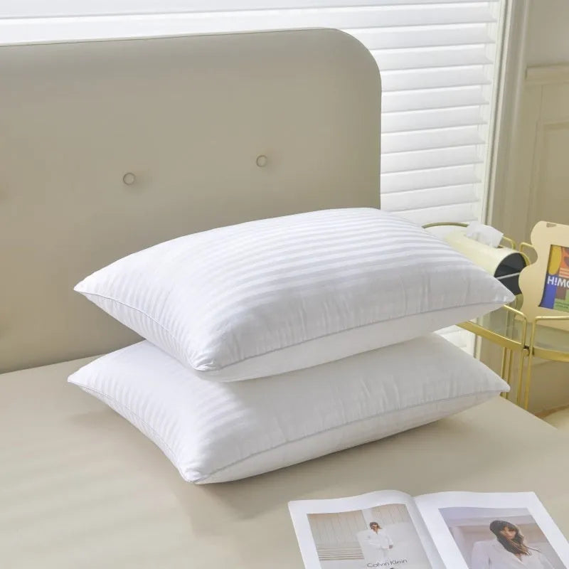 White hotel cotton satin stripe feather and cotton pillow showing size options.