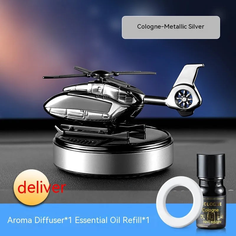 Camouflage patterned solar car perfume decoration for vehicle dashboard odour removal.