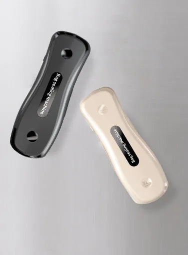Milky white portable kitchen sealer with USB charging cable and compact dimensions