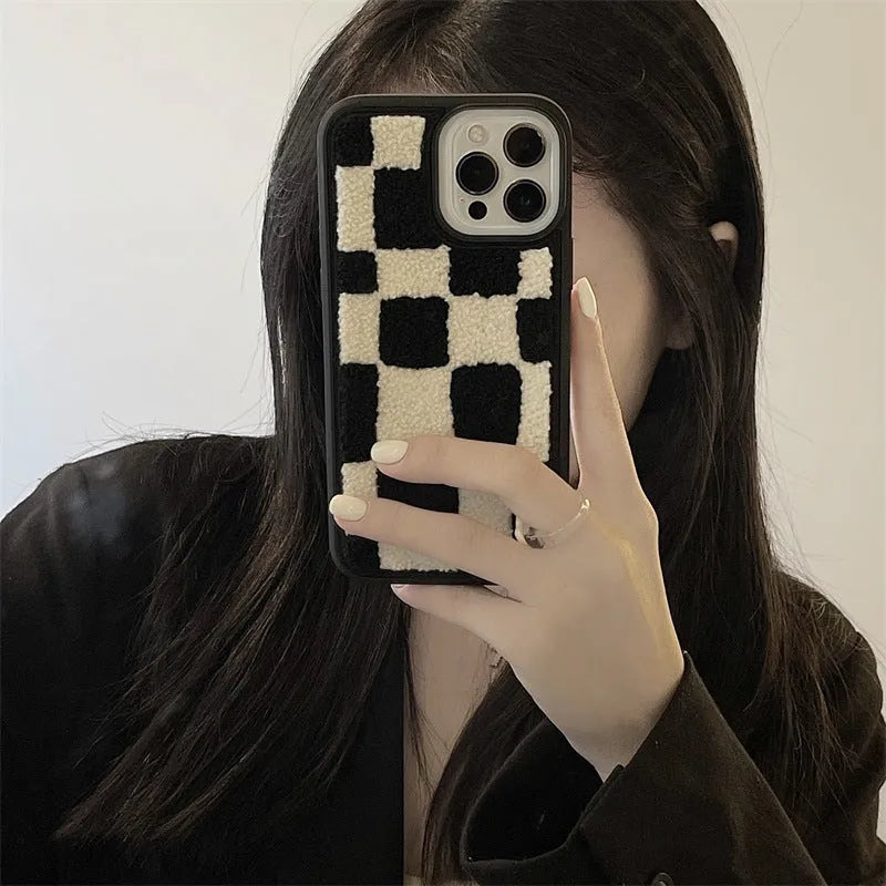 Black and white lattice silicone back cover for Apple iPhone models, including iPhone 14 and iPhone 13