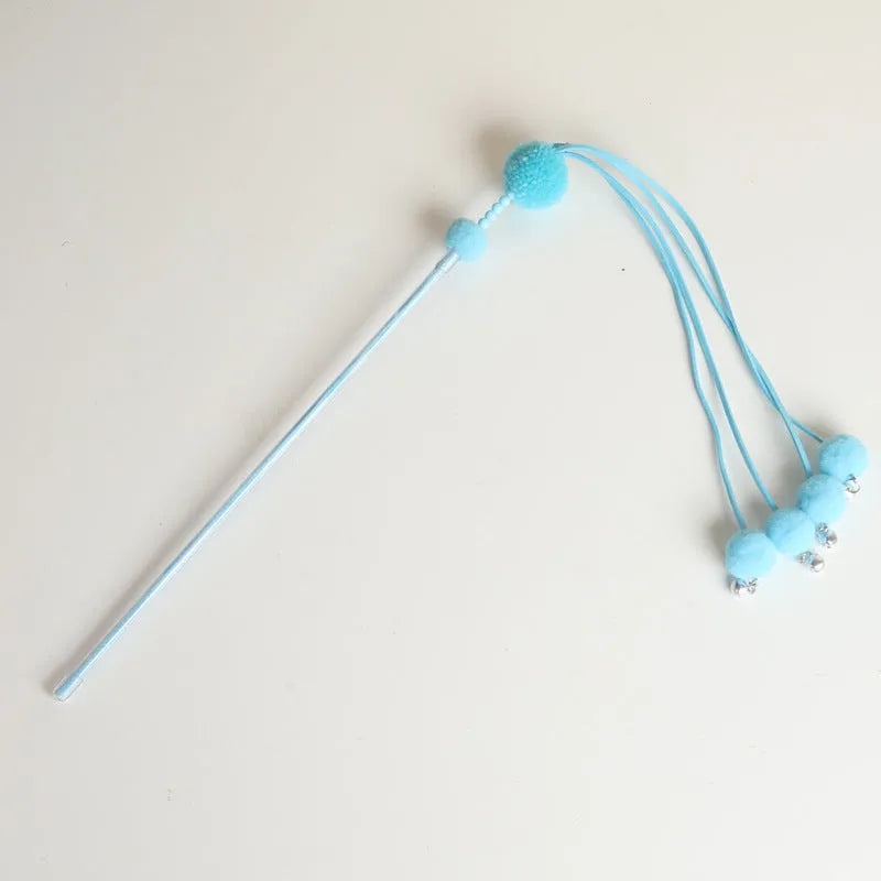 Blue cat toy stick with elastic cord and feather tassel for interactive play