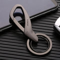 Black zinc alloy double ring car keychain attached to a belt loop.