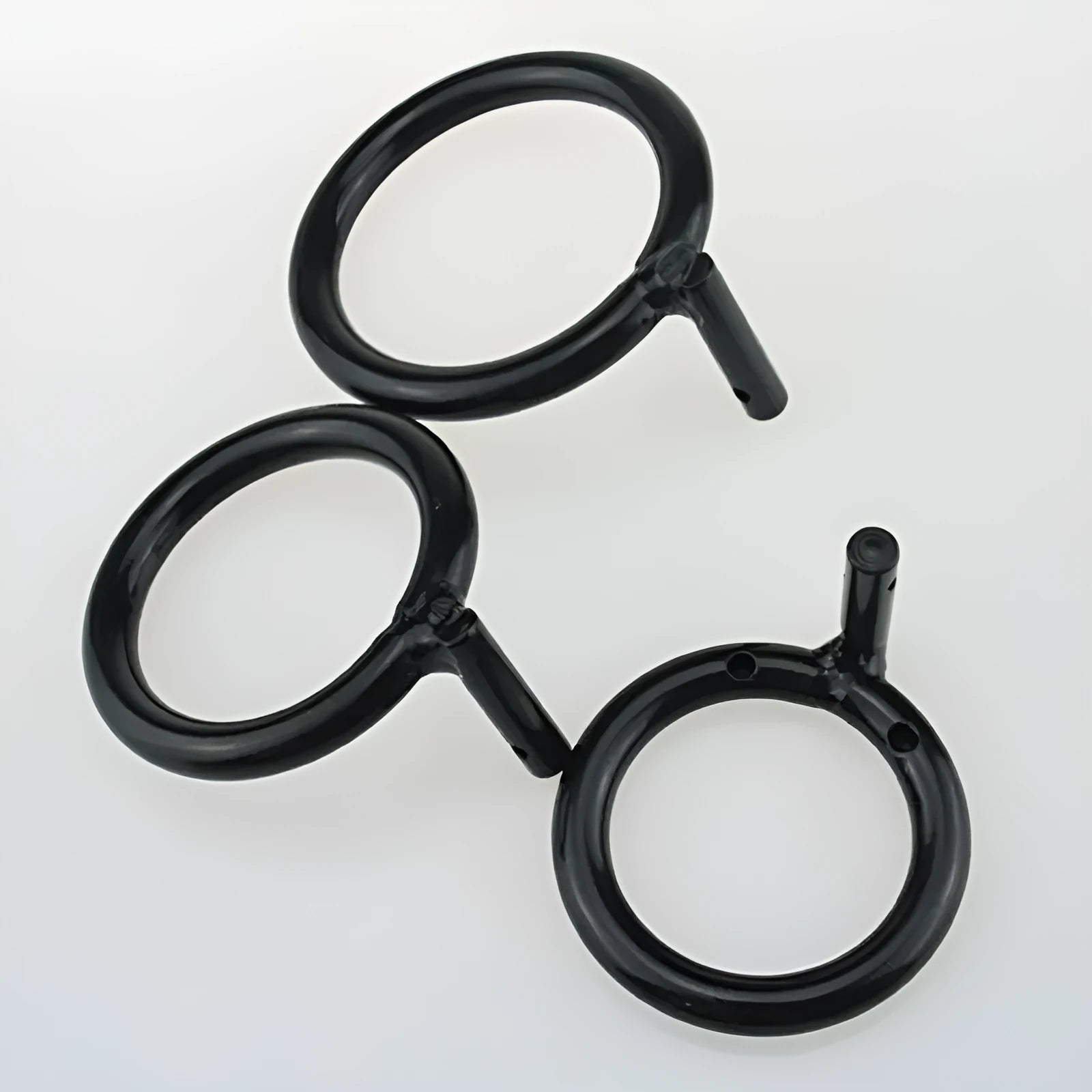 Black manganese steel men's chastity lock ring for sexual pleasure, shown on a neutral background