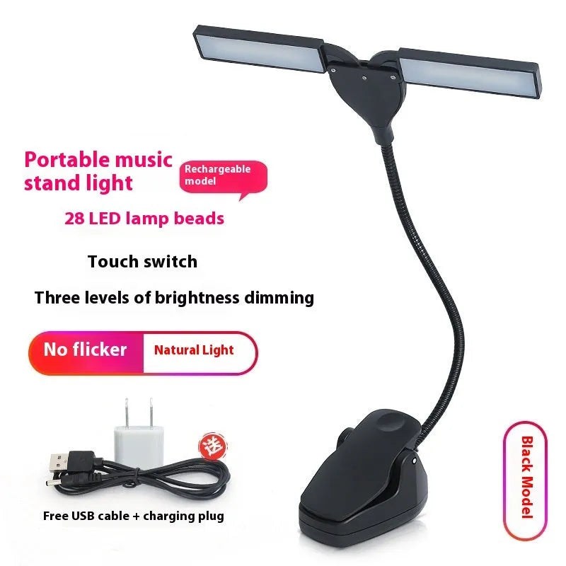 Black rechargeable music stand lamp with 28 LEDs and USB cable on a music stand.