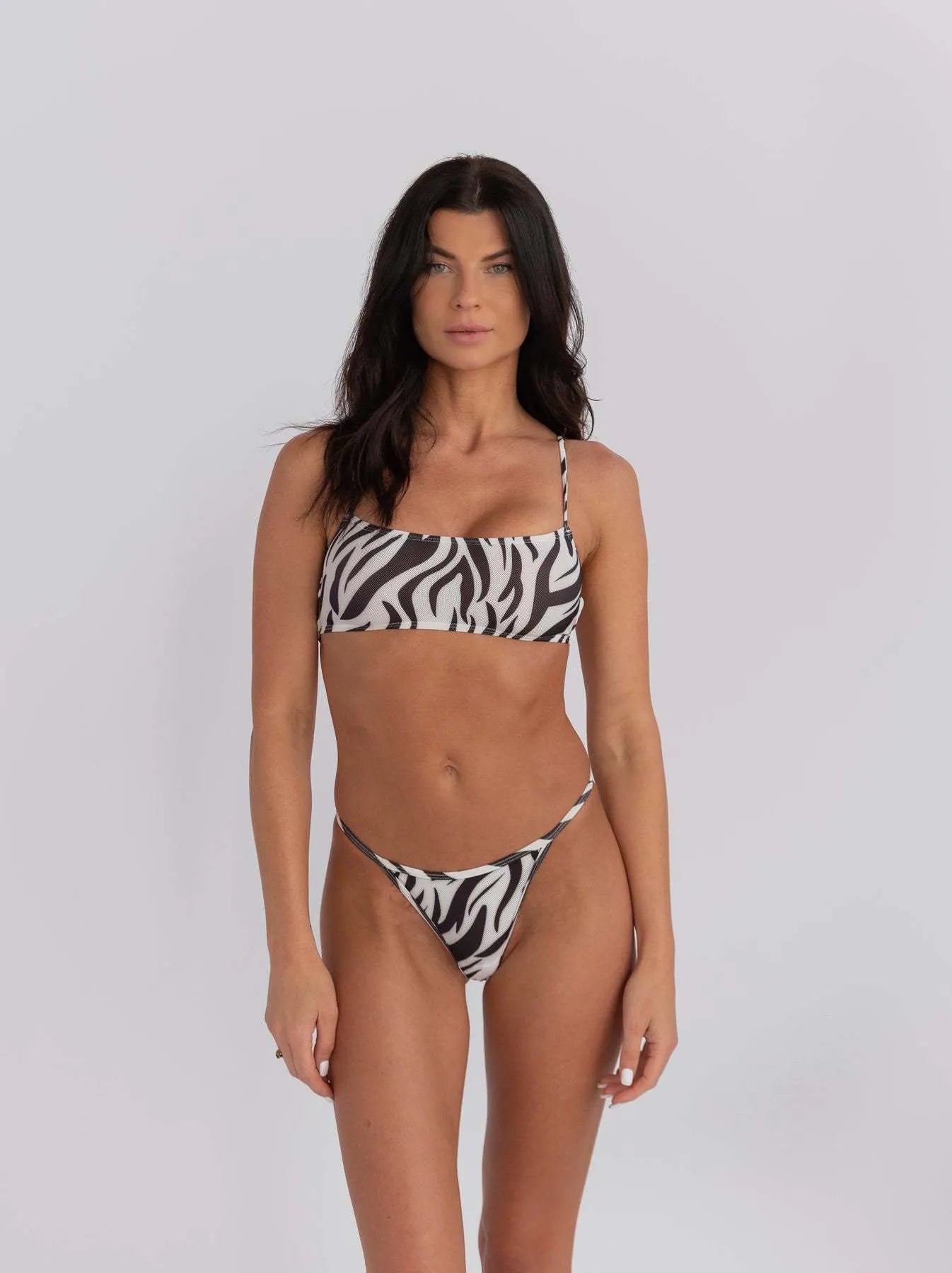 Women's striped bikini swimsuit with banded bust and triangle briefs strap design