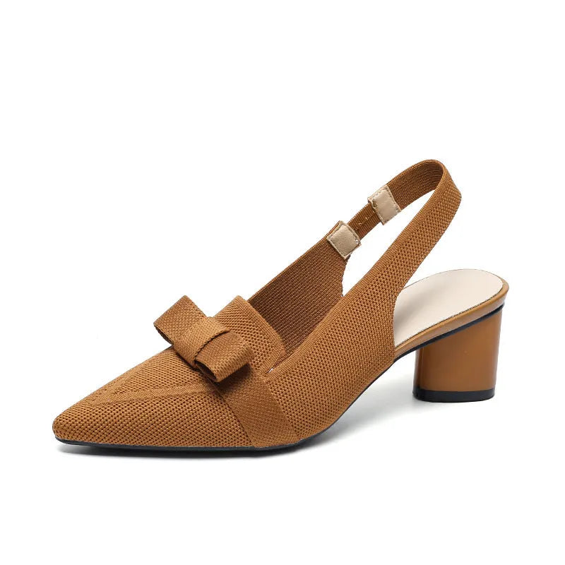 Women's closed toe high heel sandals with an ankle back strap in a pointed toe design on a rubber sole