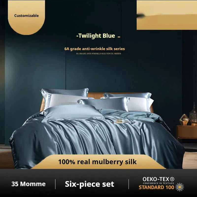 A silk four-piece quilt cover set in a solid colour, shown on a bed with matching sheets.