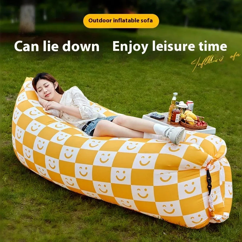 Inflatable lazy sofa in outdoor setting with colourful design options