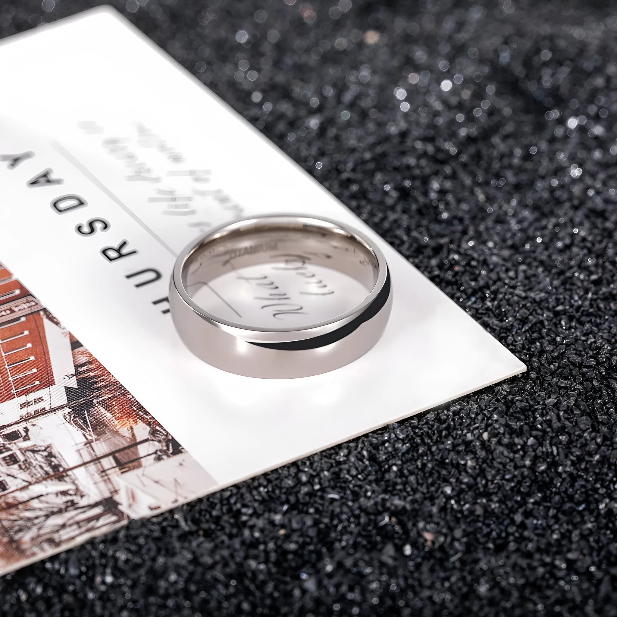 Solid titanium steel unisex ring in matte silver finish, shown in 2mm, 4mm, and 6mm band widths.